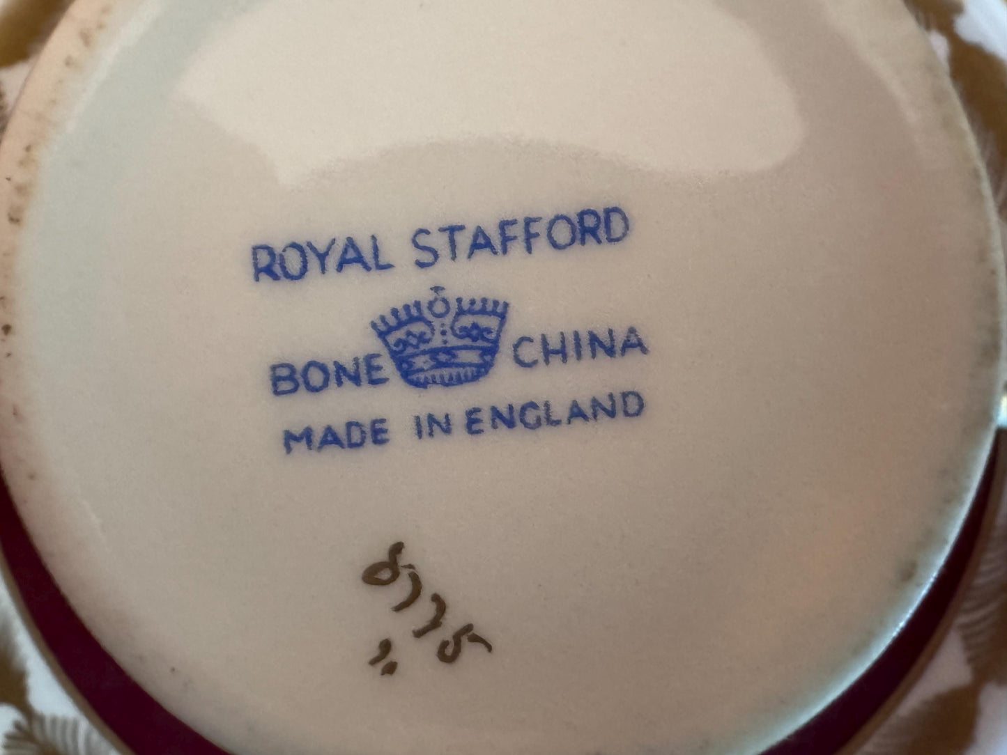 Royal Albert Burgundy Teacup & Saucer with Gold Feather Motif
